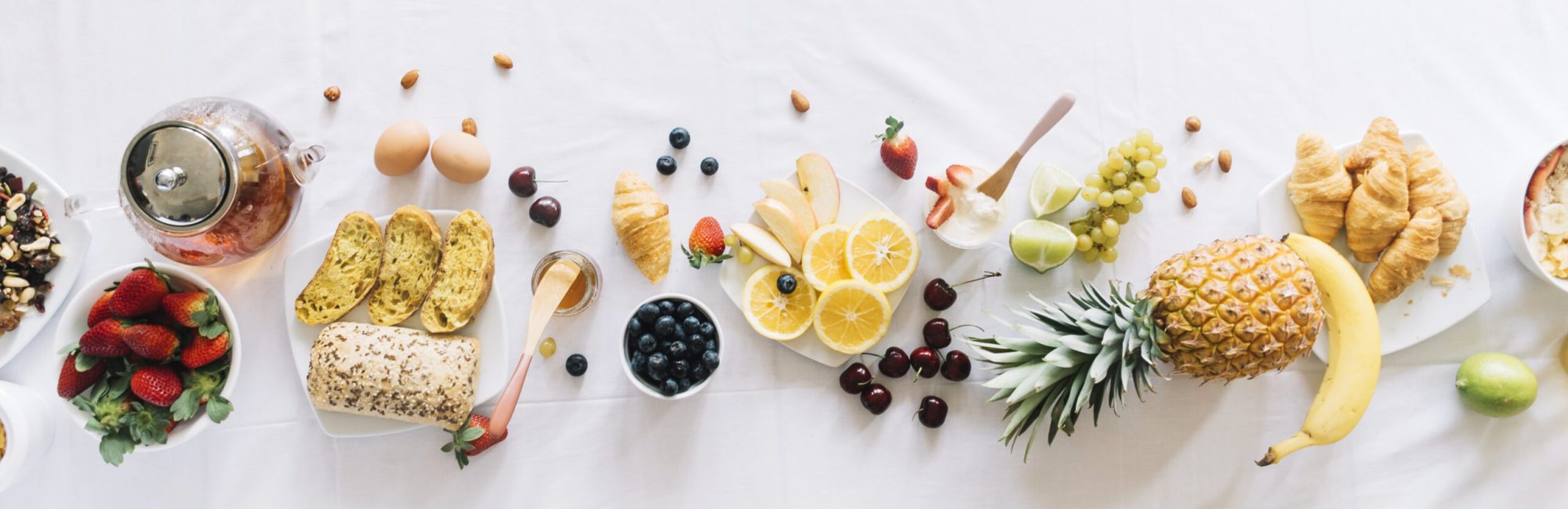 elevated-view-of-healthy-breakfast-on-white-background